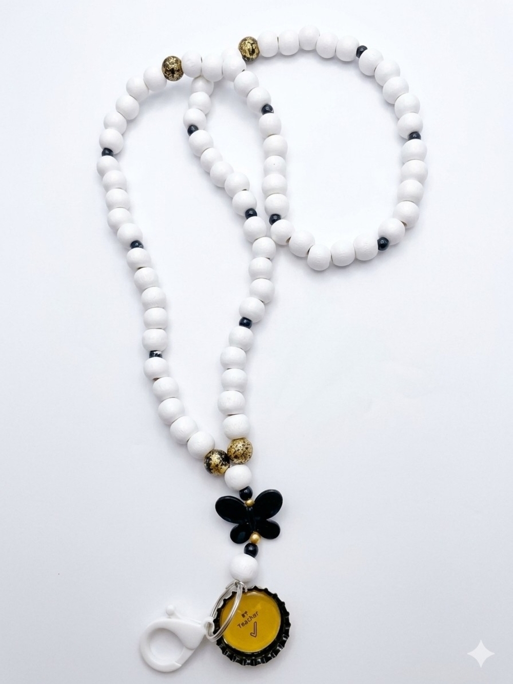 Handcrafted White Beaded Lanyard With Butterfly Charm and Gold Accents